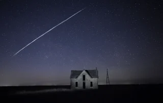 shooting star above the house